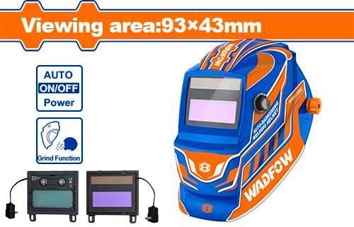 Auto-darkening welding helmet